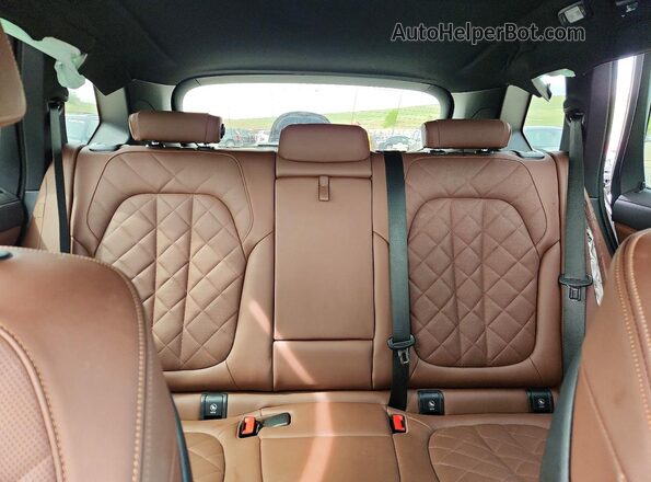 5UX23EU02S9Y45873 2025 BMW X5 Silver Rear seats view