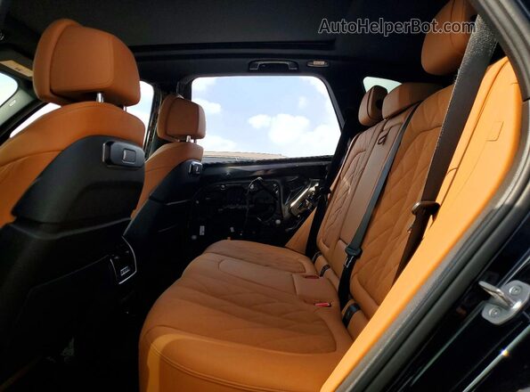 5UX23EU07R9W14123 2024 BMW X5 Blue Rear interior view