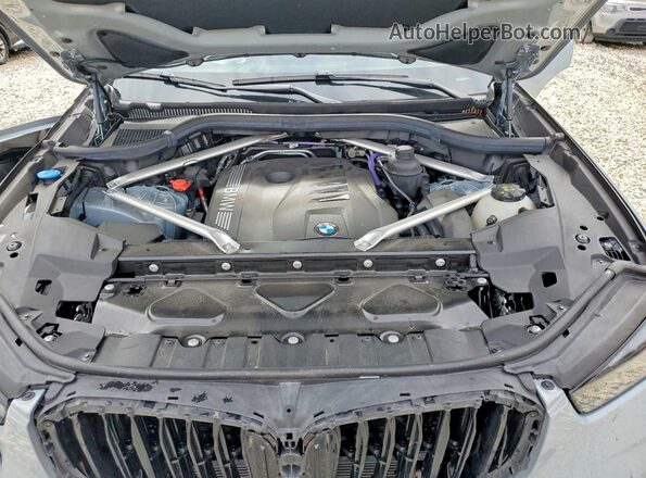 5UX23EU07S9X98498 2025 BMW X5 Серый Вид задней части салона