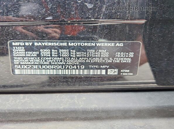 5UX23EU08R9U70419 2024 BMW X5 Charcoal VIN კოდის სტიკერის ხედი