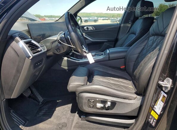 5UX23EU09R9V08644 2024 BMW X5 Black Front interior view