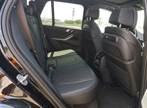 5UX23EU09R9V08644 2024 BMW X5 Black Rear interior view
