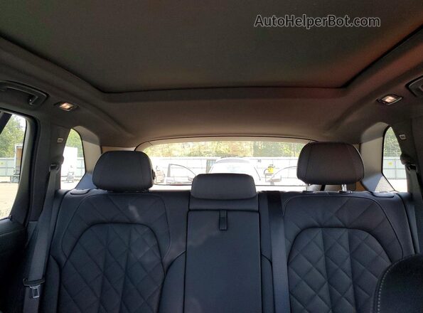 5UX23EU09R9V08644 2024 BMW X5 Black Rear seats view