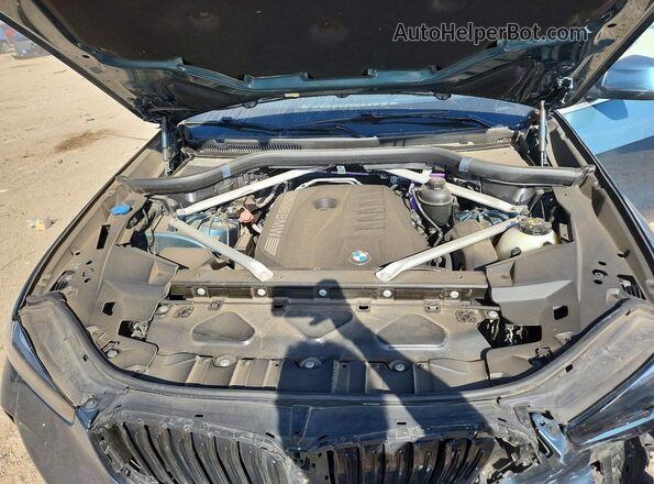 5UX23EU0XR9V47890 2024 BMW X5 Blue Rear interior view
