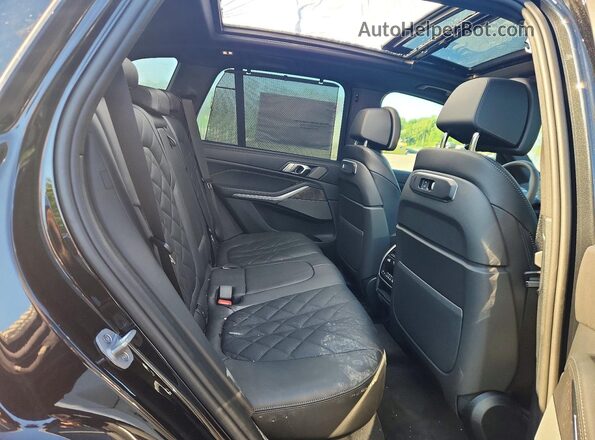 5UX23EU0XT9384861 2026 BMW X5 Black Vista interior trasera
