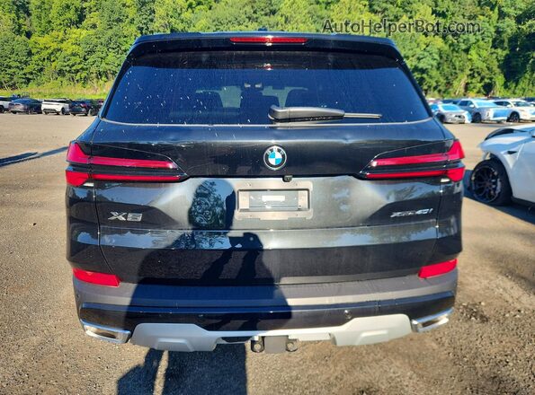 5UX23EU0XT9384861 2026 BMW X5 Black Vista trasera