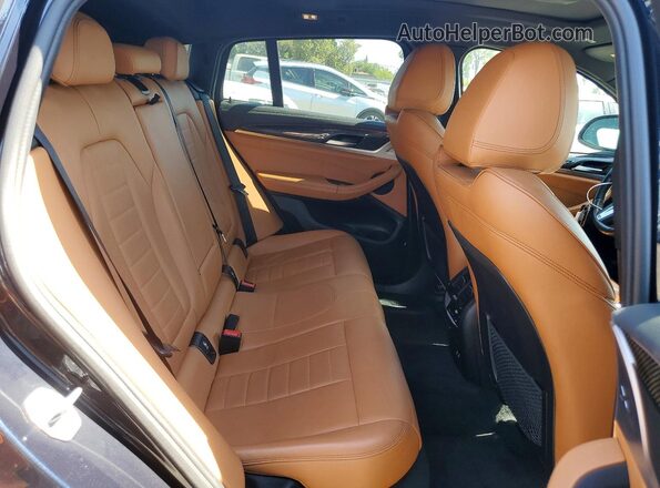 5UX2V1C07LLE67576 2020 BMW X4 Black Вид задньої частини салону
