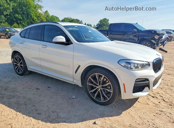 5UX2V1C08M9H97399 2021 BMW X4 White Front right