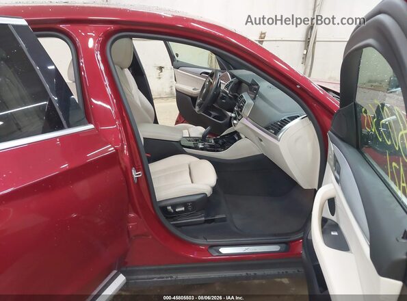 5UX2V1C09M9F04769 2021 BMW X4 Red Вид салону спереду