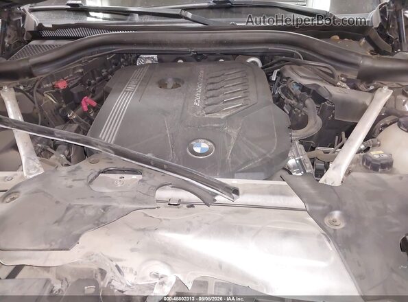 5UX2V5C02LLE69646 2020 BMW X4 Black Հետևի տեսք