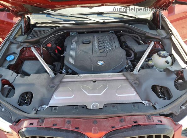 5UX2V5C03M9E83165 2021 BMW X4 Red Vista interior trasera