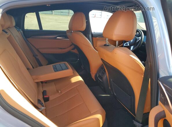 5UX33DT01R9X29946 2024 BMW X4 Gray Вид задньої частини салону