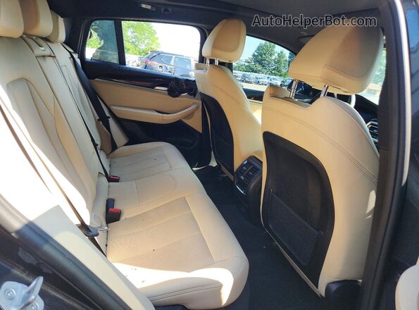 5UX33DT07R9V93371 2024 BMW X4 Серый Вид задней части салона