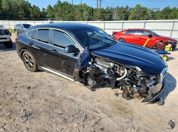 5UX33DT08R9X09659 2024 BMW X4 Black Front right