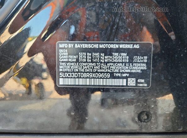 5UX33DT08R9X09659 2024 BMW X4 Black VIN sticker view