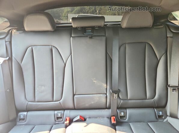 5UX33DT08R9X09659 2024 BMW X4 Black Rear seats view