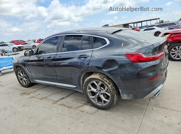 5UX33DT09R9V05727 2024 BMW X4 Black Tył lewy