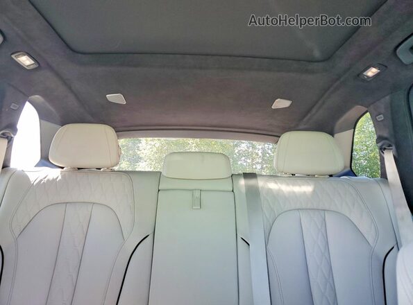 5UX33EU05R9U01899 2024 BMW X5 Green Widok tylnych siedzeń
