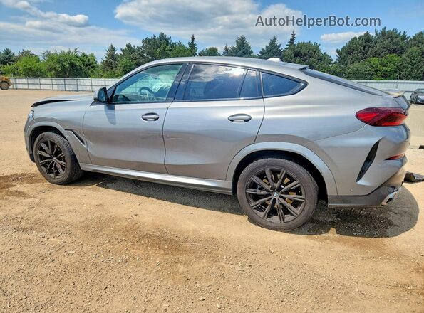 5UX33EX00S9W23381 2025 BMW X6 Silver Trasero izquierdo