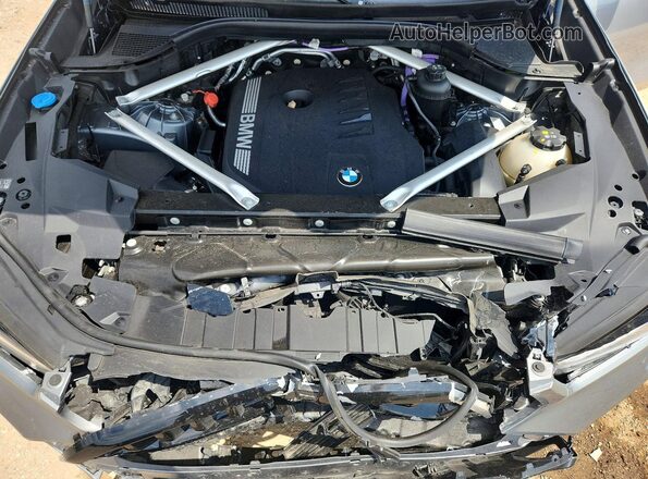 5UX33EX00S9W23381 2025 BMW X6 Silver Vista interior trasera
