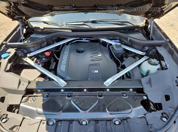 5UX33EX00S9Y25007 2025 BMW X6 Black Vista del compartimento del motor
