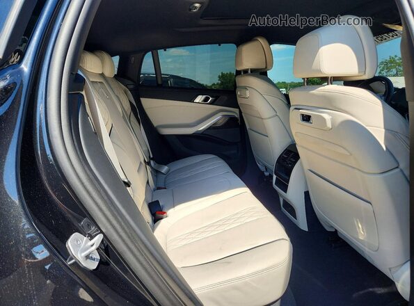 5UX33EX00S9Y25007 2025 BMW X6 Black Vista interior trasera