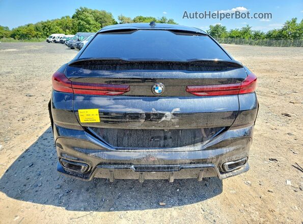 5UX33EX00S9Y25007 2025 BMW X6 Black Vista trasera
