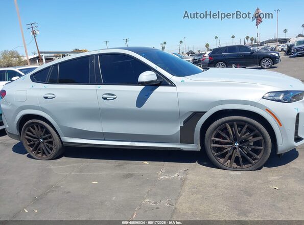 5UX33EX03R9S44739 2024 BMW X6 Gray Widok wnętrza z tyłu