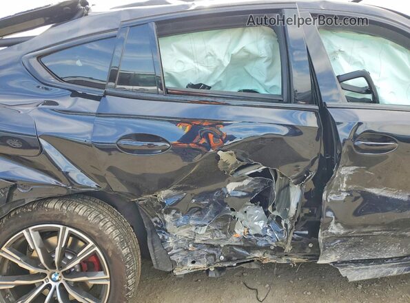 5UX33EX04T9253358 2026 BMW X6 Blue უკანა სავარძლების ხედი