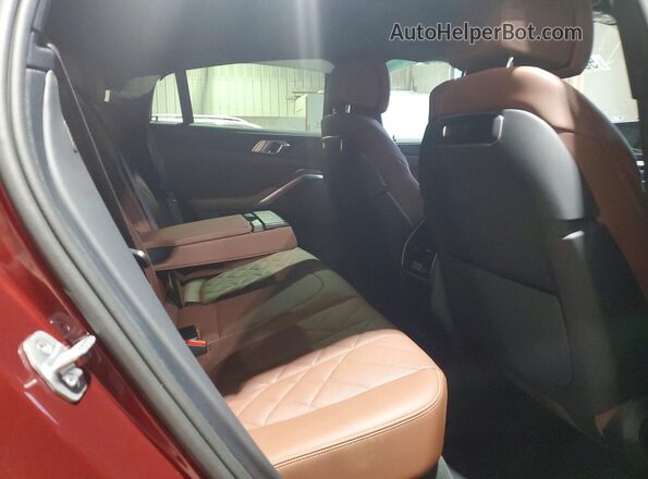 5UX33EX04T9322792 2026 BMW X6 Burgundy Vista interior trasera