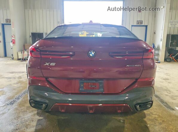 5UX33EX04T9322792 2026 BMW X6 Burgundy Vista trasera
