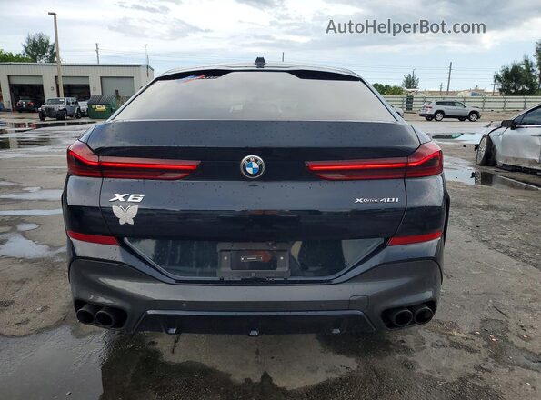 5UX33EX08R9V08764 2024 BMW X6 Blue Вид ззаду