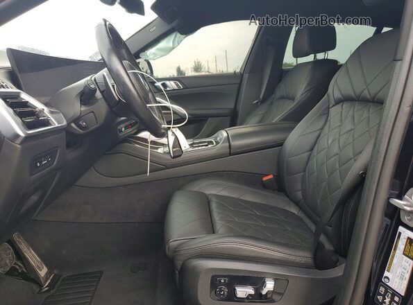 5UX33EX08R9V08764 2024 BMW X6 Blue Вид салону спереду
