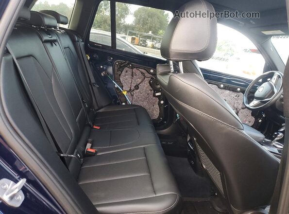 5UX43DP03N9K62716 2022 BMW X3 Blue Rear interior view