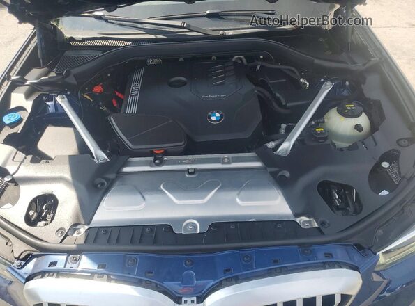 5UX43DP07P9P86387 2023 BMW X3 Blue Widok wnętrza z tyłu