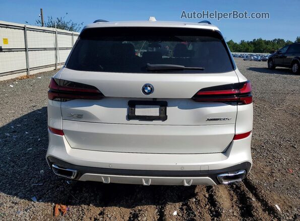 5UX43EU05R9V29323 2024 BMW X5 White Rear view