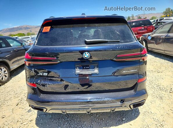 5UX43EU06T9068432 2026 BMW X5 Black Вид ззаду