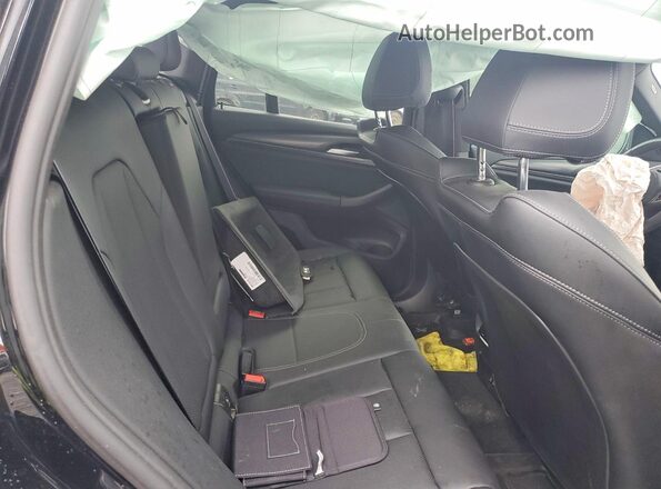 5UX53DP00R9W43904 2024 BMW X3 Black Вид задньої частини салону
