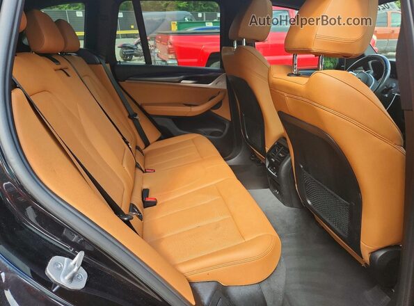5UX53DP05R9T66036 2024 BMW X3 Black Rear interior view