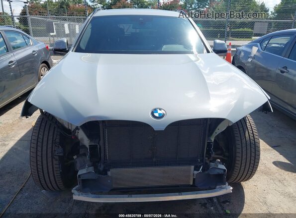 5UX53DP06N9K72211 2022 BMW X3 Gray Vista interior trasera