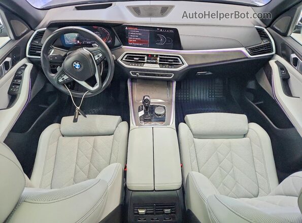 5UXCR4C00P9R29468 2023 BMW X5 Зеленый Вид панели приборов