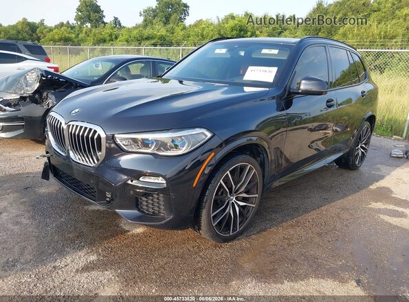 5UXCR4C01M9G97719 2021 BMW X5 Black Vista tres cuartos delantera izquierda