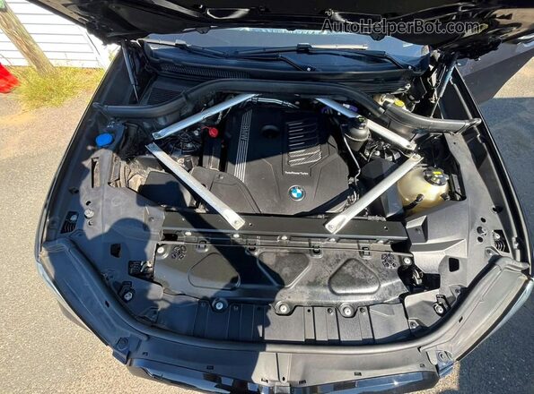 5UXCR6C01P9P71587 2023 BMW X5 Black Widok wnętrza z przodu