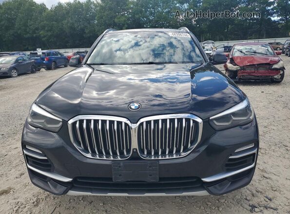5UXCR6C04L9B16210 2020 BMW X5 Black Vista interior trasera