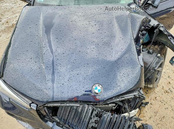 5UXCR6C54KLK80583 2019 BMW X5 Black Vista del compartimento del motor