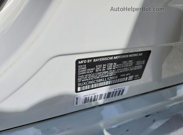 5UXCR6C58KLL12869 2019 BMW X5 White Vista del compartimento del motor