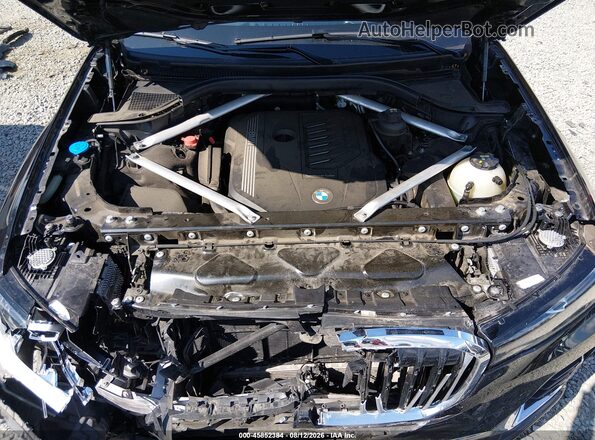 5UXCW2C01L9C60010 2020 BMW X7 Black Vista trasera