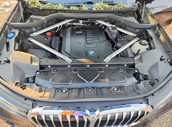 5UXCW2C07M9E64988 2021 BMW X7 Black Սալոնի հետևի տեսք