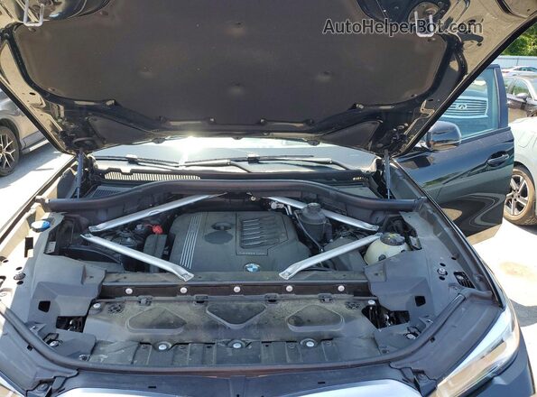 5UXCY6C01L9D04637 2020 BMW X6 Black Vista del compartimento del motor