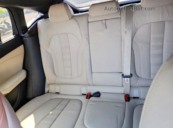 5UXCY6C02M9E83434 2021 BMW X6 Black Rear seats view